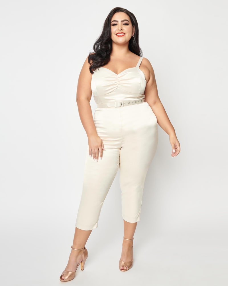 Front of a model wearing a size 4X Unique Vintage Cream Satin Bridal Marcel Jumpsuit in White by Unique Vintage. | dia_product_style_image_id:287865